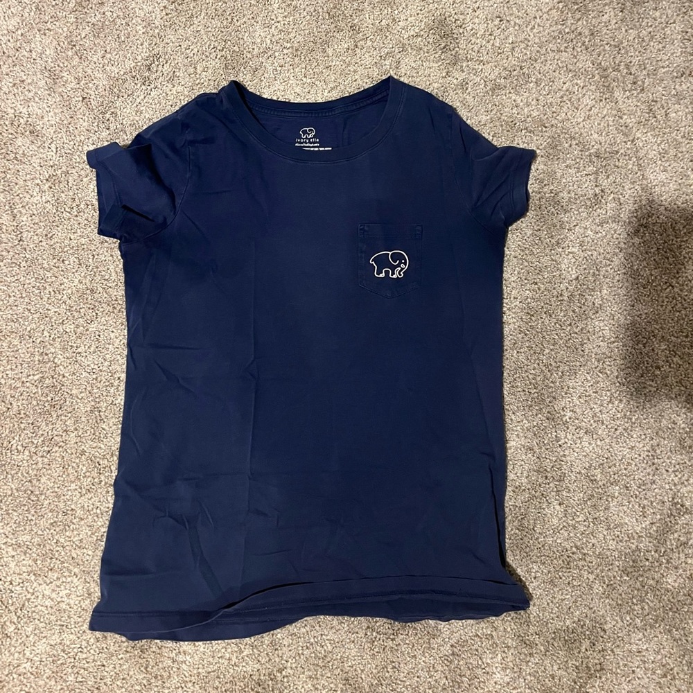 Ivory Ella navy blue t-shirt with a lacrosse stick on back. Size S